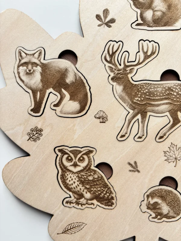 Puzzle forme feuille en bois - Les animaux de la forêt - zoom sur les gravures
