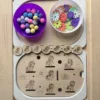 insert sensoriel licornes en bois avec pompons et fleurs pour activité de tri et motricité fine