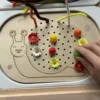 insert sensoriel en bois escargot motricité fine enfant qui insère un picot