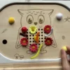 Jeu de motricité fine hibou en bois – manipulation par enfant