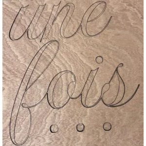 Décoration murale en bois gravée avec le texte Il était une fois...