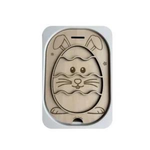 Insert sensoriel en bois thème Pâques représentant un lapin dans un œuf, support éducatif évolutif conçu pour développer la motricité fine et l’autonomie des jeunes enfants.