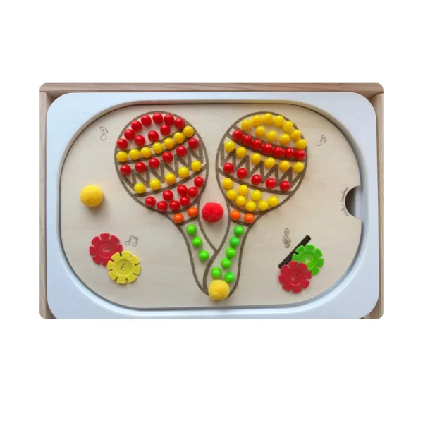 Insert sensoriel en bois - les maracas remplies de picots