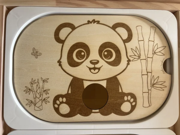 insert sensoriel en bois le panda avec son trou pour insérer balles, pompons ou autres